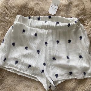 white flowey shorts